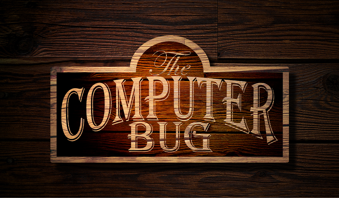 The Computer Bug's distinctive wooden storefront sign